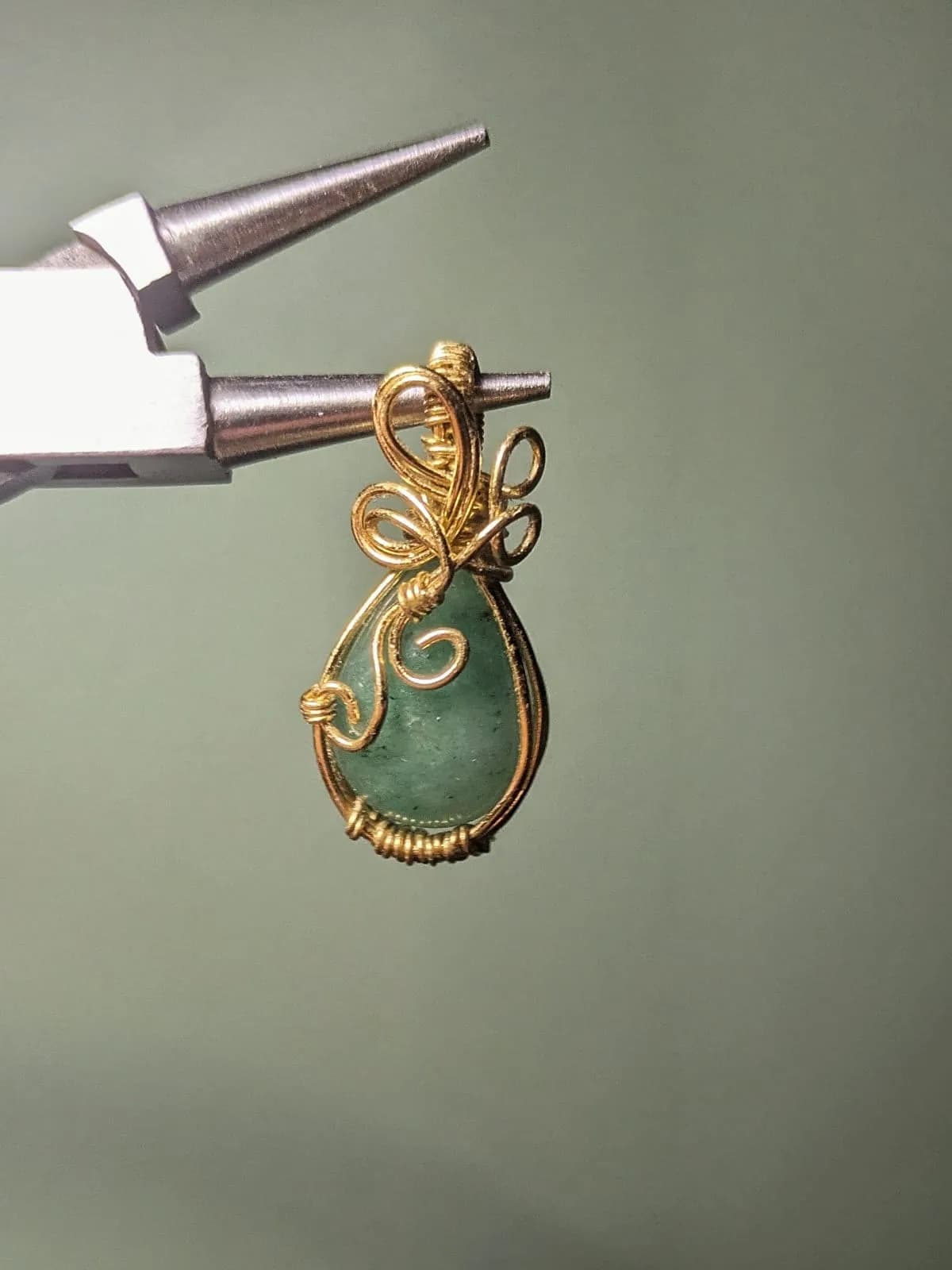 Pendentif doré et aventurine